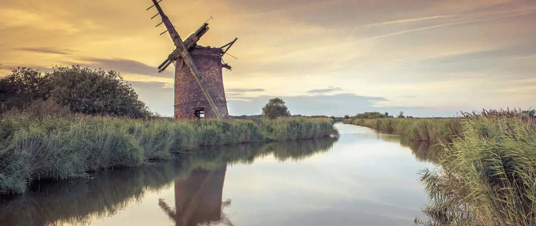 Antique wooden windmill in East Anglia for dog walking guide