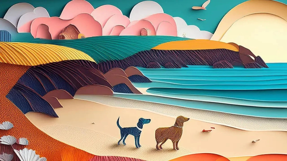 Paper cutout beach scene with dogs, rocks in dog-friendly Cornwall.