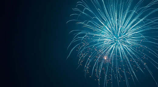 Blue fireworks with white trails over dark sky in Natural Cornish Pet New Year 2022 roundup