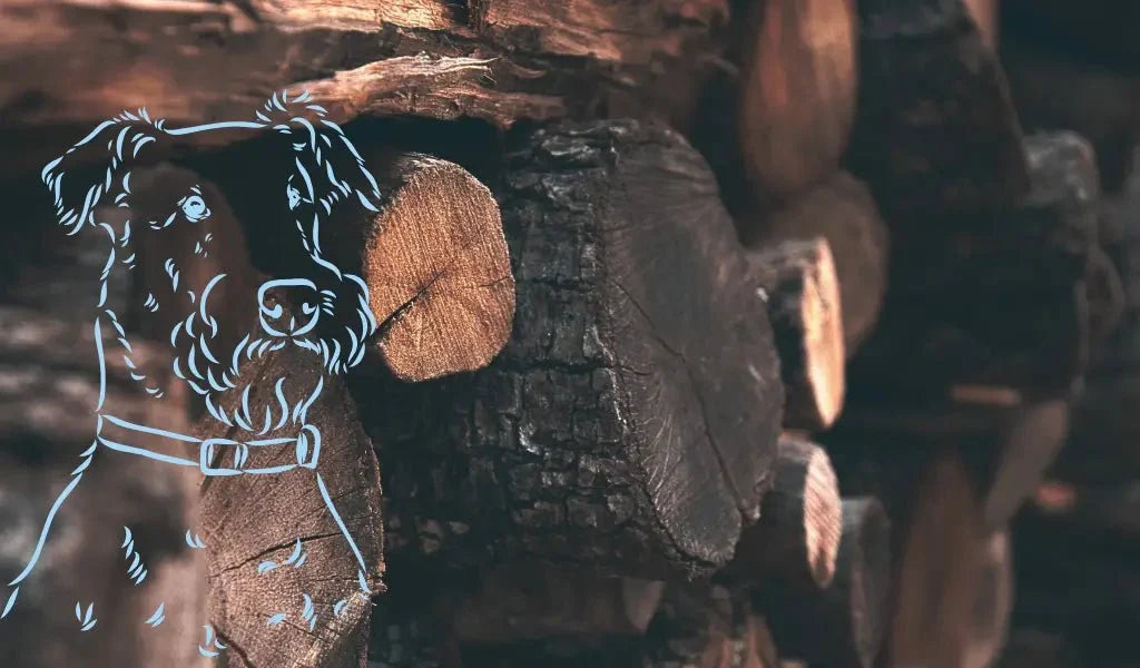 Black and white dog-shaped wood carving on chewing helps and baby teeth.