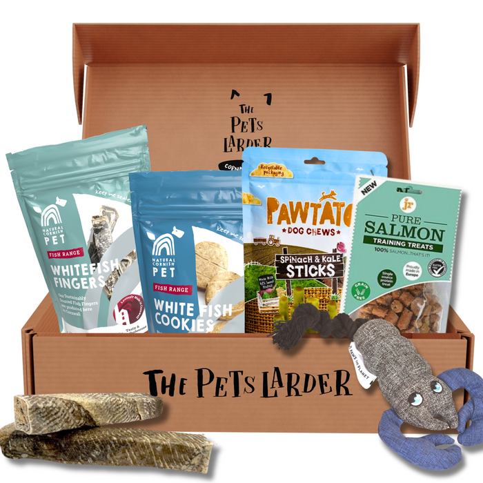Dog treat and toy box from 'The Pets Larder' with various pet products.