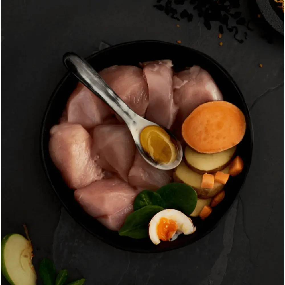 Canagan grain free free range chicken cat food with raw fish and vegetables