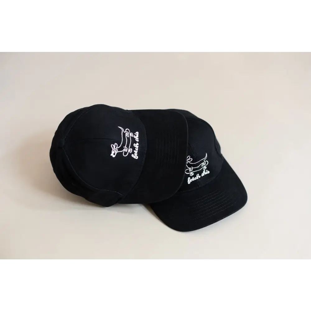 Black cotton cap with white logo, perfect for casual wear and outdoor activities