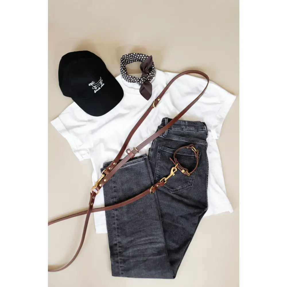 Black cotton cap with white logo and adjustable strap from Fetch This collection