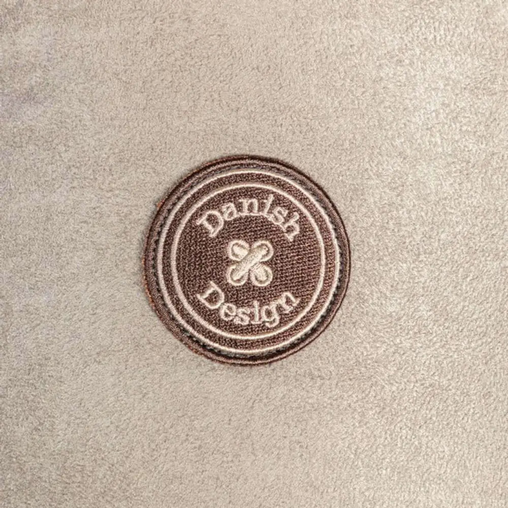 Chemical-free Danish Design logo patch on faux suede cat cosy bed