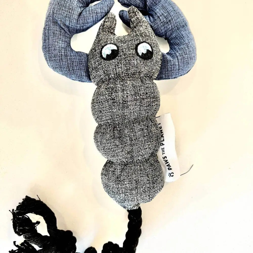 Eco-conscious lobster dog toy: gray plush caterpillar from recycled fabrics