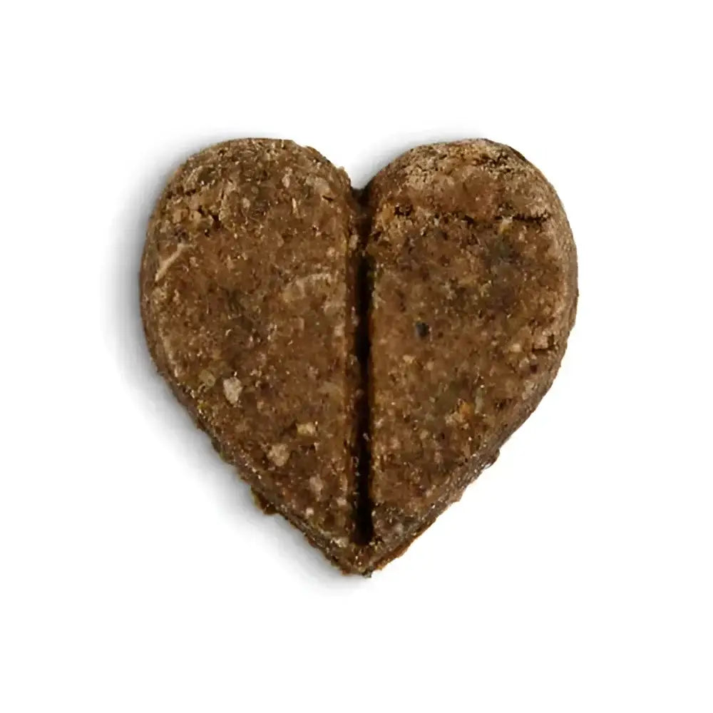 Heart-shaped Forthglade Soft Bites Treats Turkey with natural cat food, split in half