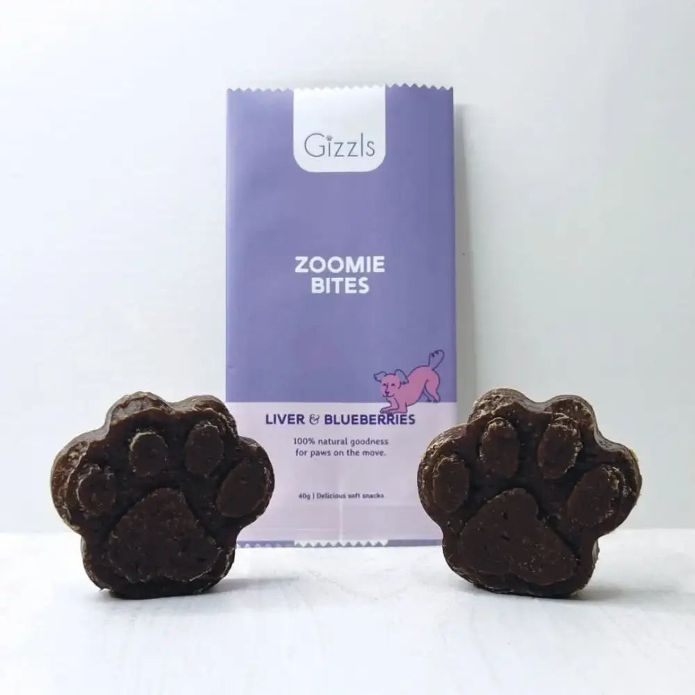Gizzls Zoomie Bites dog treats with free-range ostrich liver and blueberries, paw-shaped