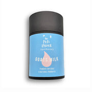 Goat’s milk powder container with blue label and black cap for healthy digestion in dogs