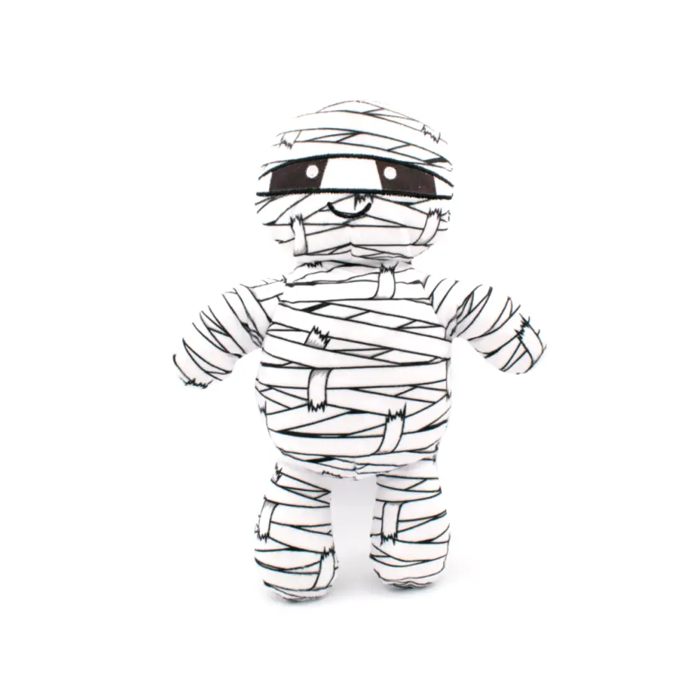 Creepy Cuties Mummy Pal Dog Toy with black eyes and bandages on white background