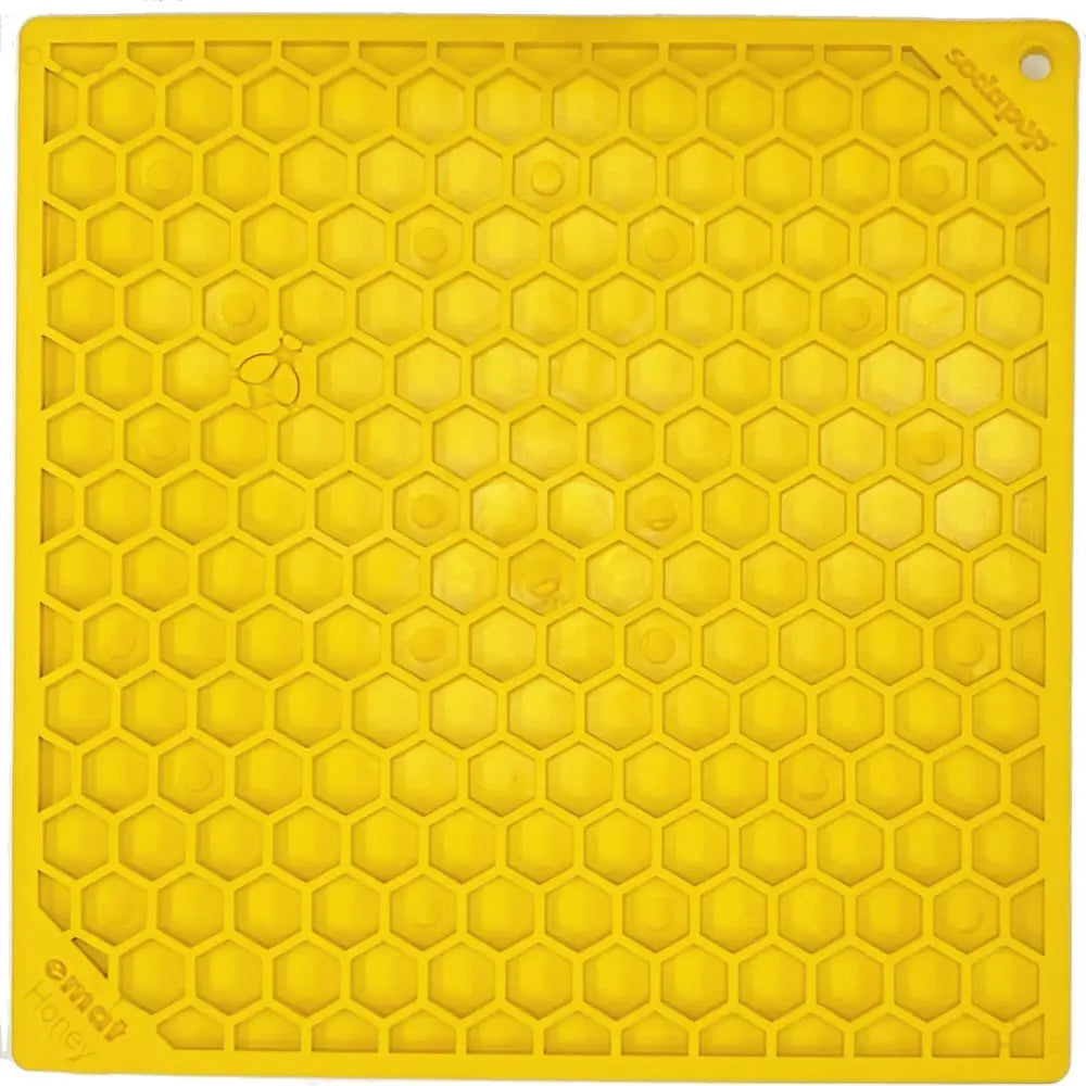 Yellow Elmo honeycomb silicone trivet for Honeycomb Enrichment Licking Mat with cornish peanut butter
