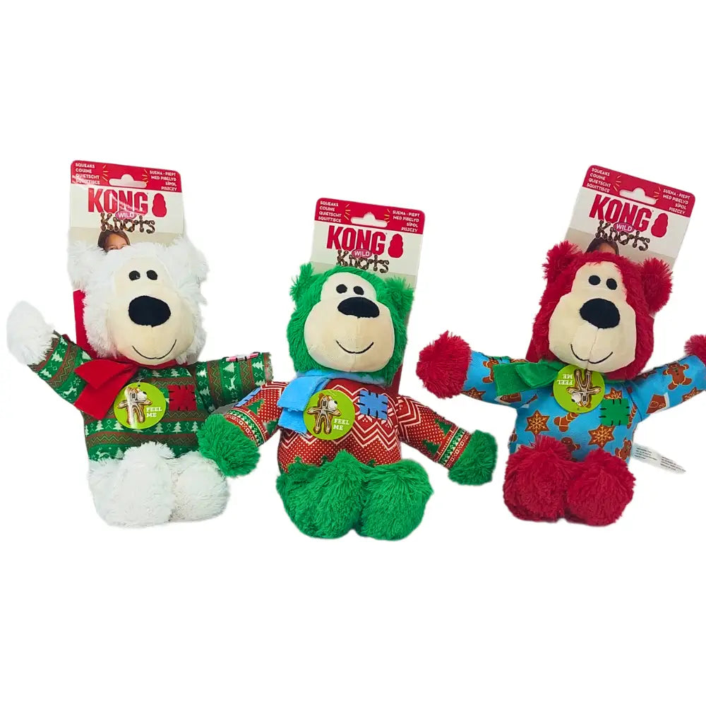 KONG Holiday Wild Knots Bear: Festive white dog plush toy with red sweater accents