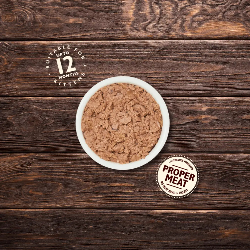 Lilys Kitchen Chicken Pate for Kittens: brown meaty bowl with white rim