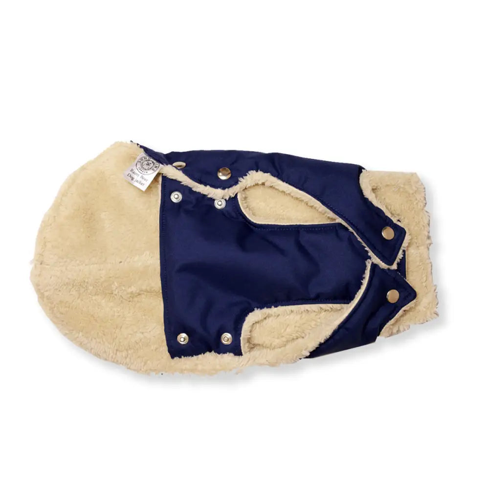 Navy blue and beige waterproof dog jacket with snap closure and sherpa lining