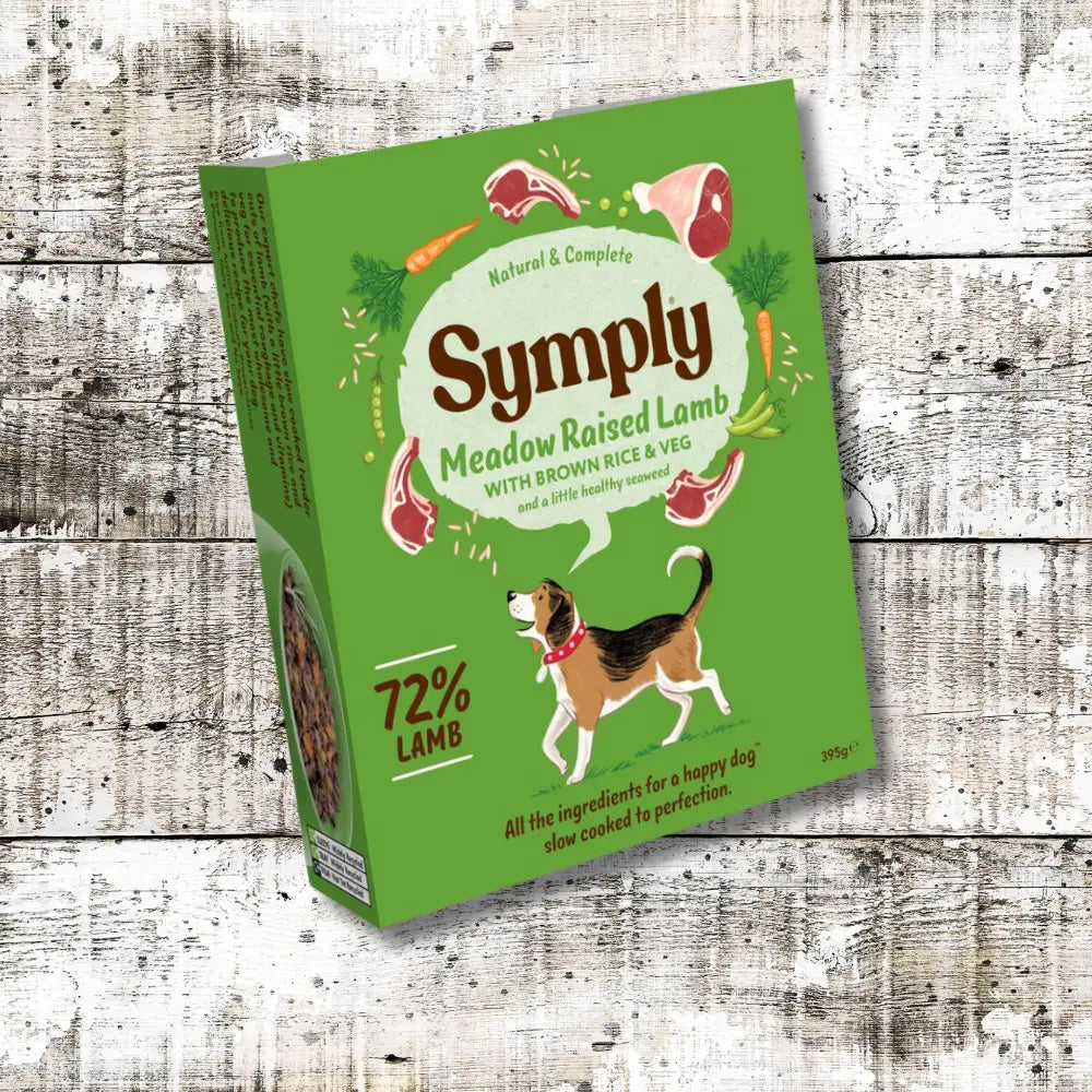 Symply Meadow Raised Lamb Adult Wet Dog Food box on wooden surface