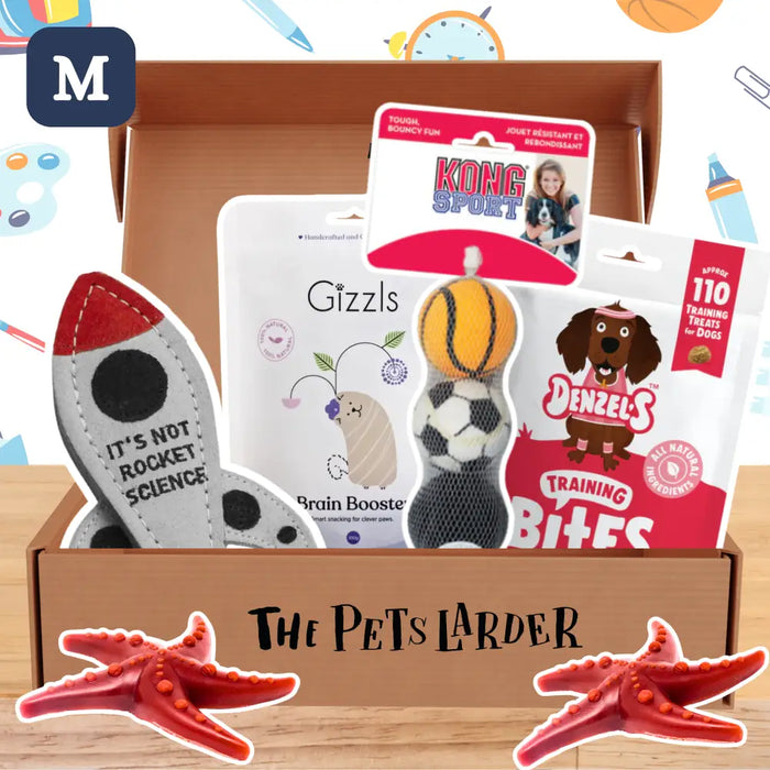Dog toy assortment in a box with 'The Pets Larder' branding.