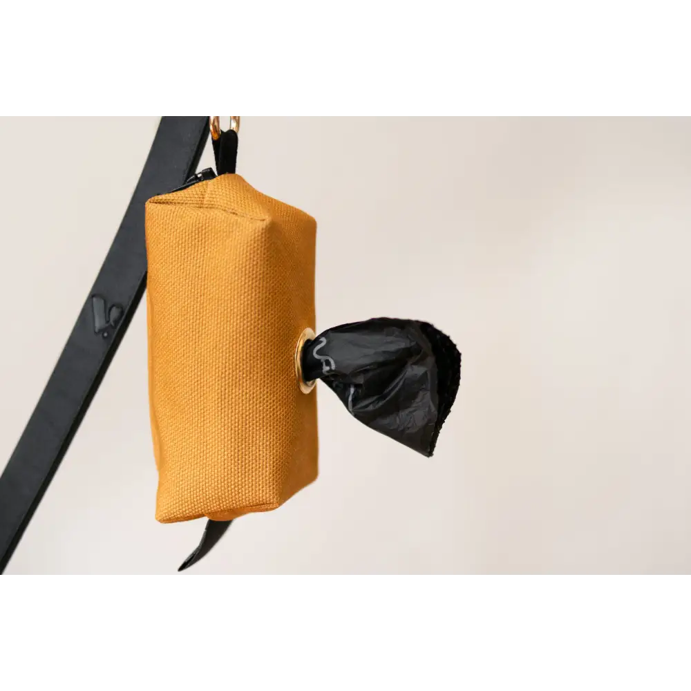 Mustard yellow canvas Waste Bag Treat Holder with black drawstring and solid brass hardware