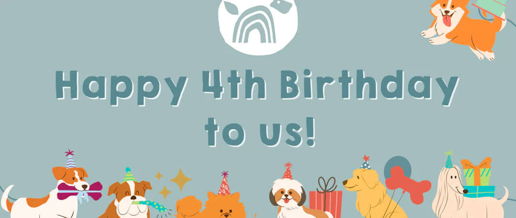 Colorful dogs and balloons on 4th Happy Barkday banner for natural Cornish pets