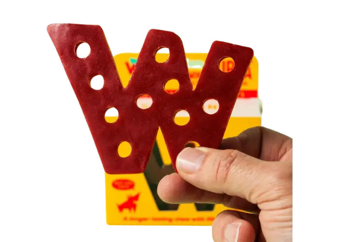 Red WZIS wooden puzzle piece with stacking holes for playful cat treats