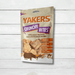 Yakers Crunchy Bites sits on a white rustic background