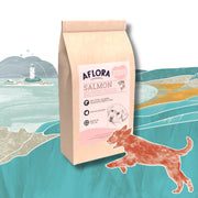 Salmon-colored bag of Aflora Puppy Salmon with Haddock grain free puppy food featuring a paw print and puppy illustration