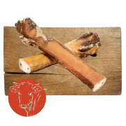 Bone-shaped dog chew toy made of natural rubber, a healthy natural alternative to bull pizzles for dog entertained