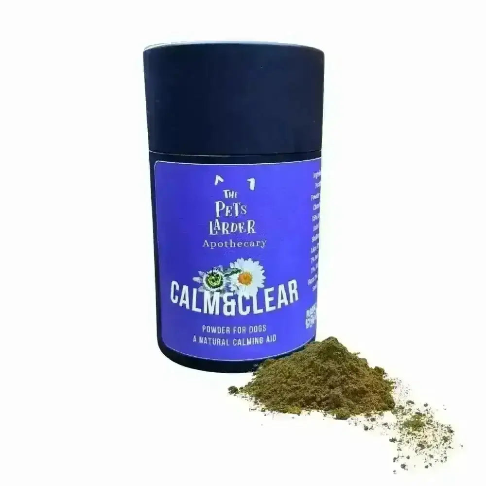 Blue container with white and yellow flower design labeled Calm & Clear for natural herbal calming dogs