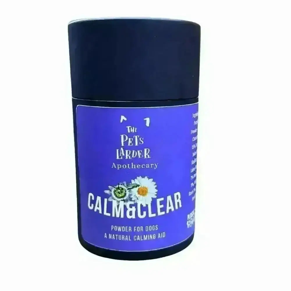 Blue powder container with floral design labeled Calm & Clear for natural herbal calming dogs