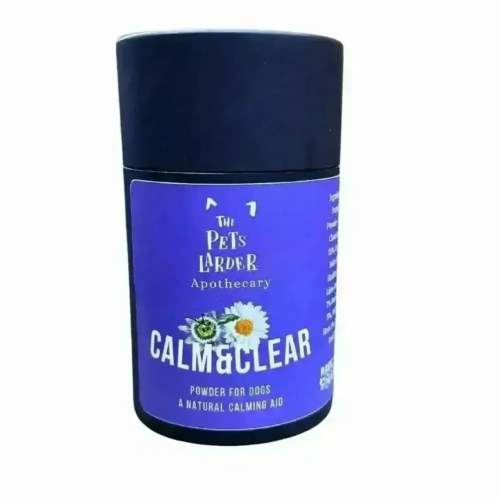Blue powder container with floral design labeled Calm & Clear for natural herbal calming dogs