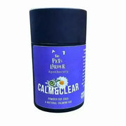 Blue powder container with floral design labeled Calm & Clear for natural herbal calming dogs