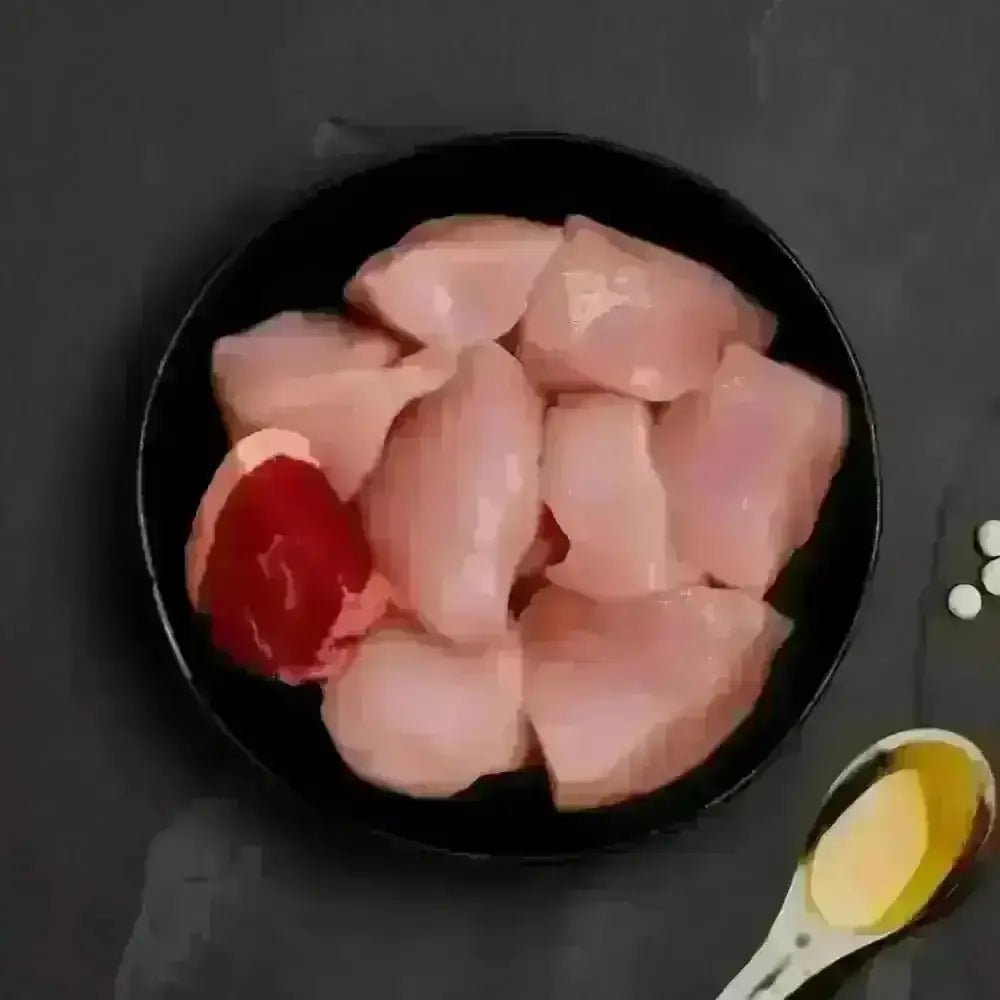 Raw chicken breast slices with red pepper and oil for Canagan Cat Food Can - Chicken with Beef