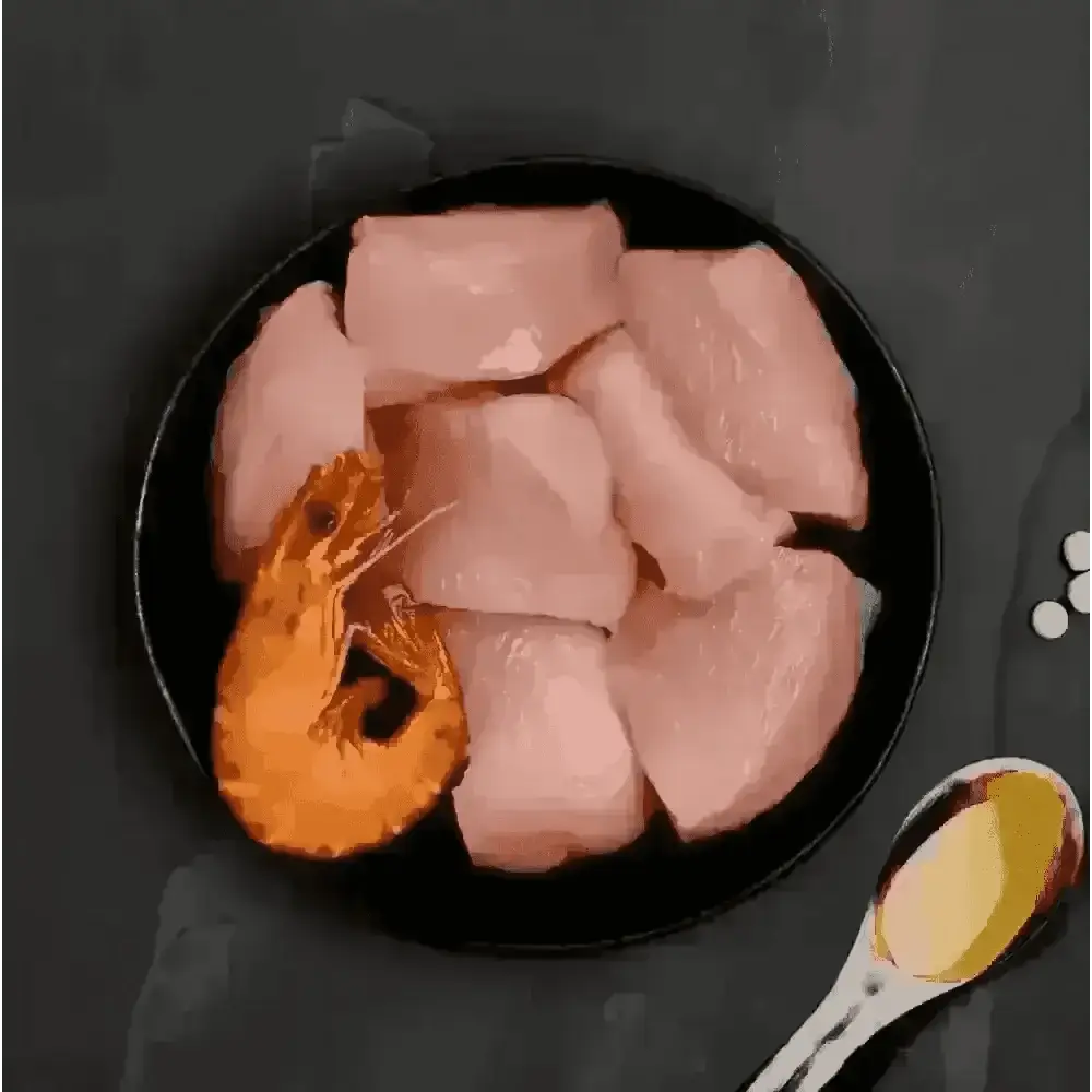Canagan highly nutritious complete cat food with raw chicken breast slices and whole shrimp