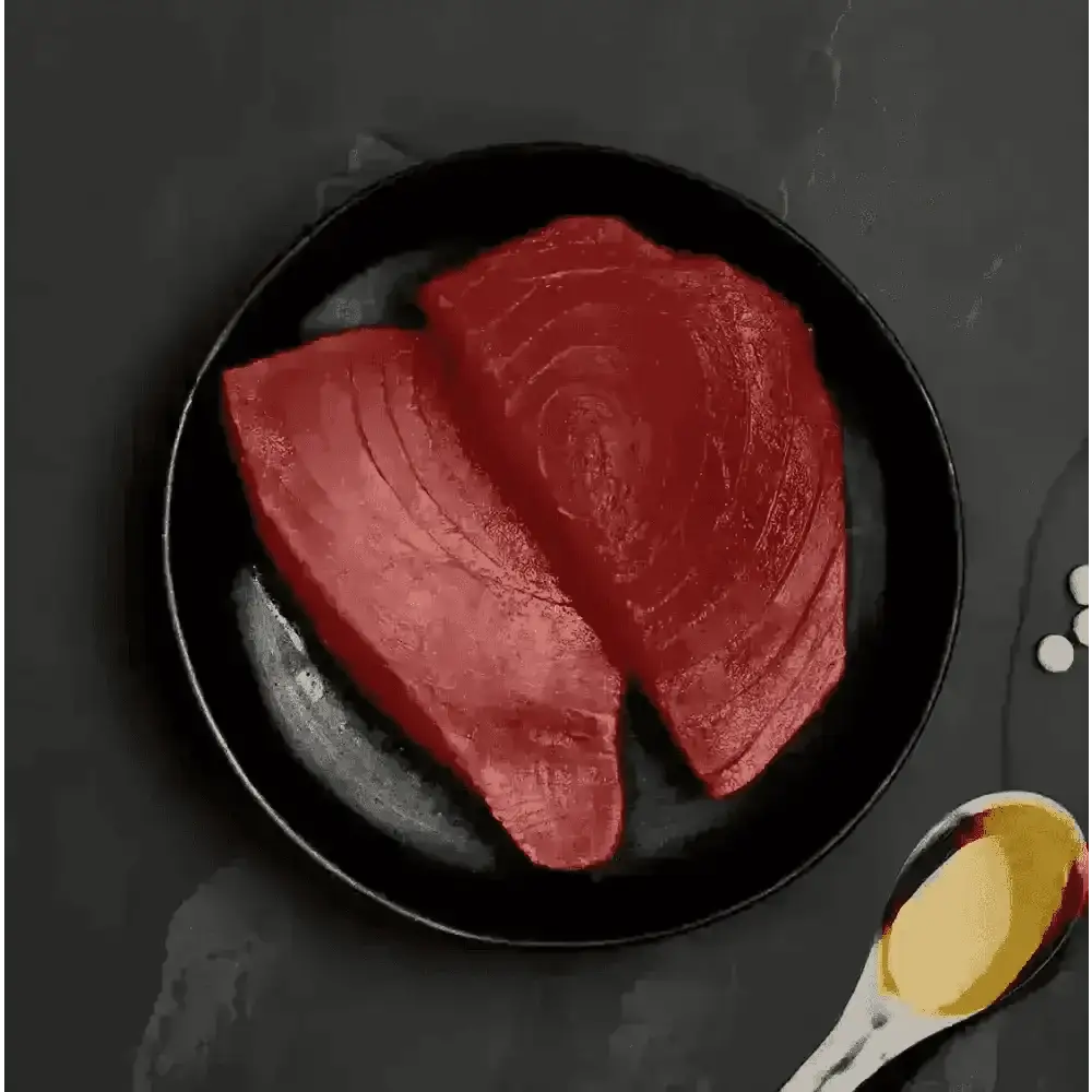 Raw ocean tuna steak plate with spoon and oil for Canagan Cat Food Can - Highly nutritious complete cat food