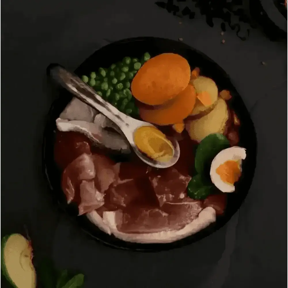 Canagan Country Game dog food in black bowl with duck, meats, veggies, eggs