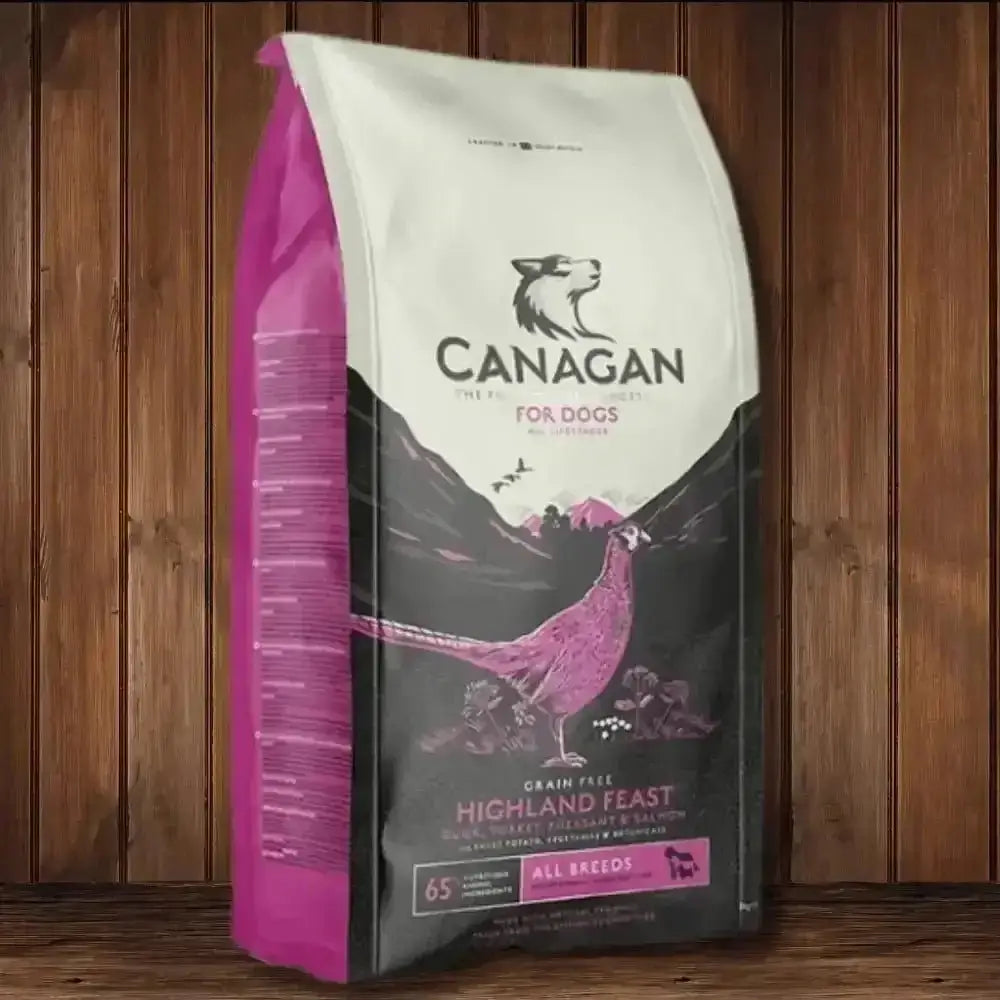 Canagan Highland Feast dog food bag with pink white packaging and bird illustration