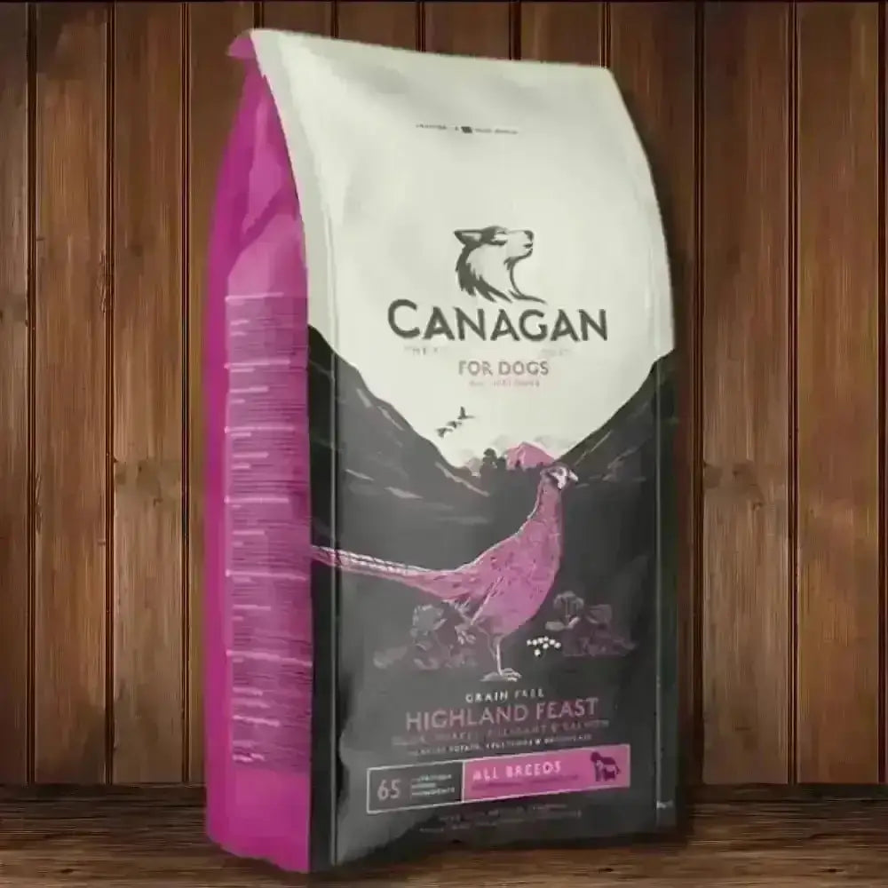 Canagan Highland Feast dog food bag with pink white packaging and bird illustration
