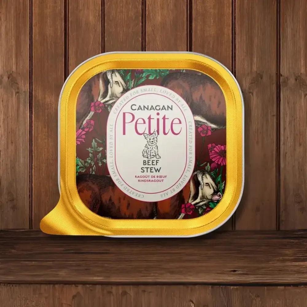 Canagan Petite Beef Stew Paté for Small Dogs in yellow and brown container with woodland animals