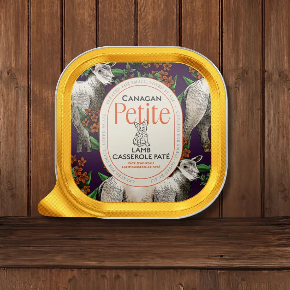 Canagan Petite Lamb Casserole Paté for Small Dogs in yellow and purple floral packaging