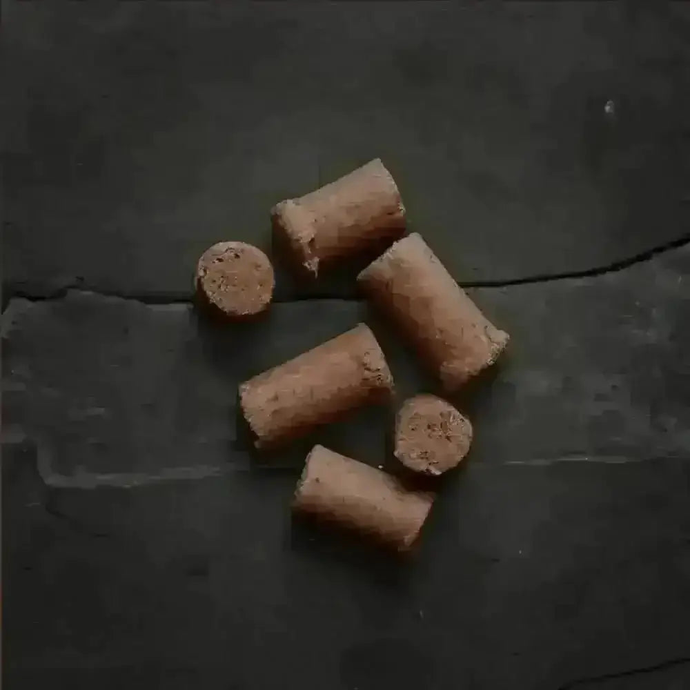 Canagan Raw Freeze Dried Beef Treats: Chocolate Wafer Rolls on Slate