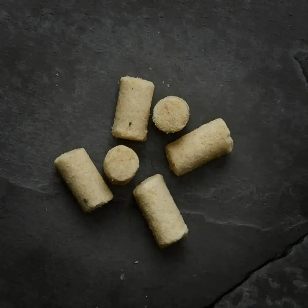 Canagan Raw Freeze Dried Fish Treats: Pale Yellow Cylindrical Delicious Bites