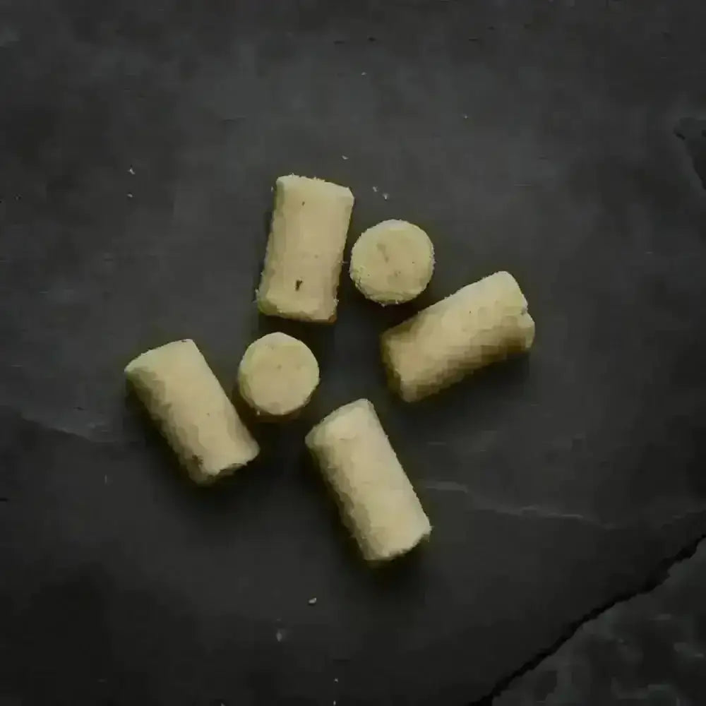 Canagan Raw Freeze Dried Fish Treats: Pale Yellow Cylindrical Delicious Bites