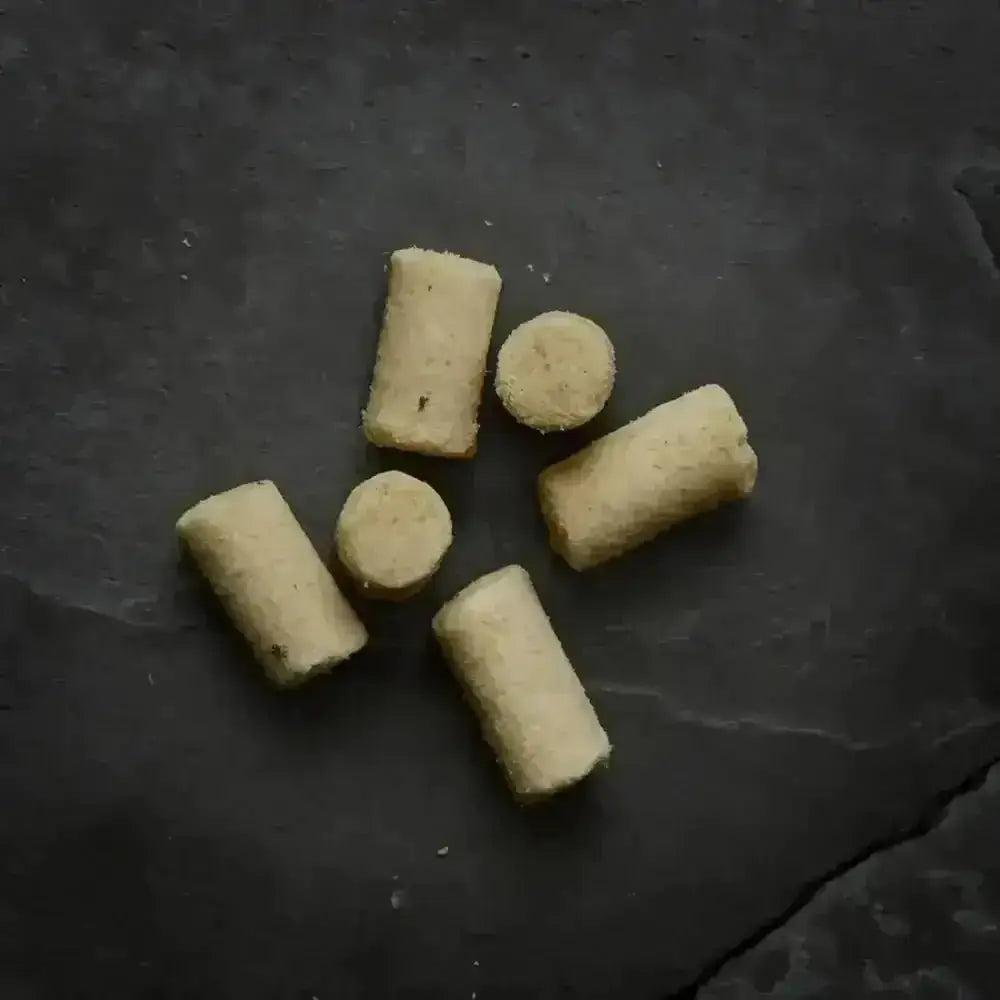 Canagan Raw Freeze Dried Fish Treats: Pale Yellow Cylindrical Delicious Bites