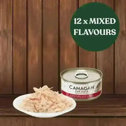 Can of Canacan cat food with a plate of cat food on a wooden background