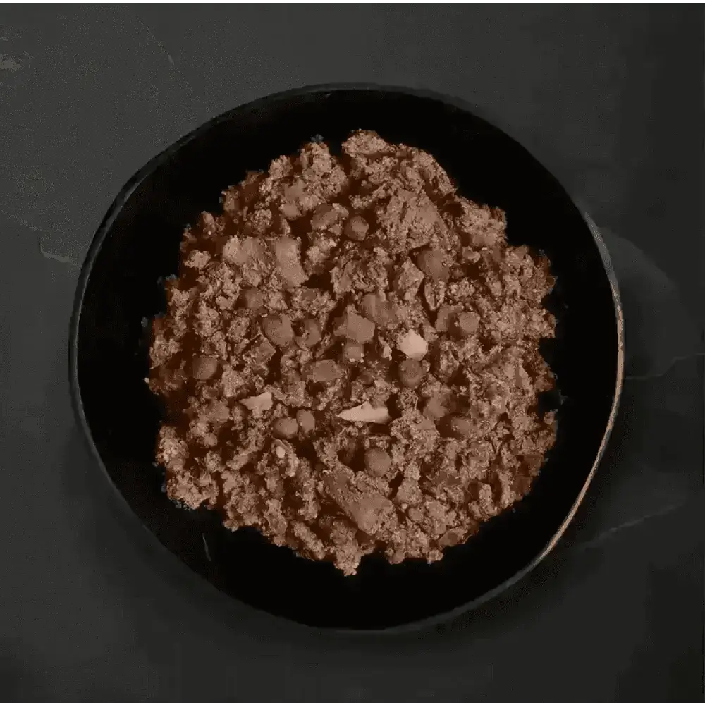 Black bowl with ground meat and peas, Canagan Wet Dog Food Can Lamb Casserole, delivered fresh