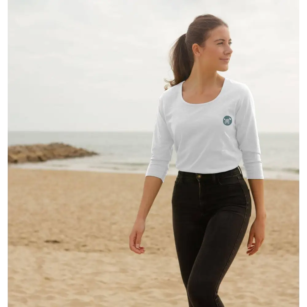 Woman in certified organic cotton Natural Cornish Pet T-shirt with black leggings and ponytail