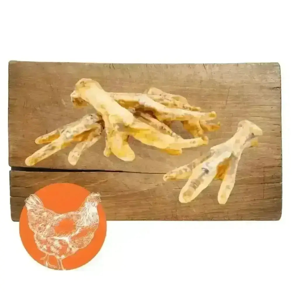 Chicken feet natural dog chew in 1kg bag on wooden crate