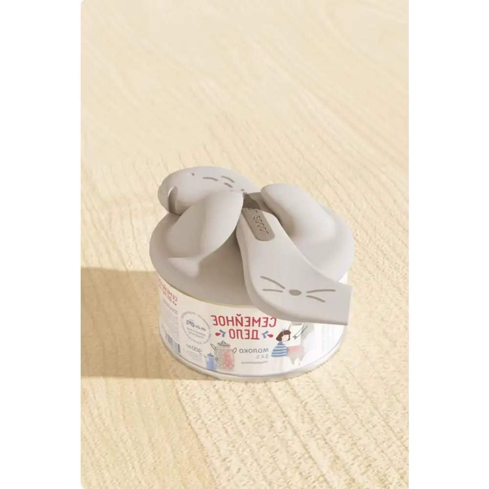 Gray ceramic cat-shaped salt shaker with whiskers and tail from Moomin, part of the silicone lid set