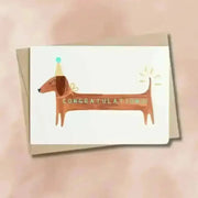 Party hat dachshund congratulations card for animal lovers