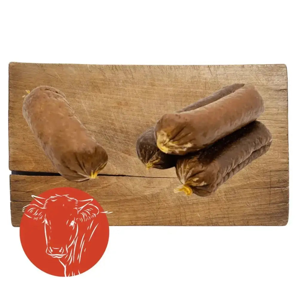 Dried Beef & Garlic Sausage on wooden board with Pets Larder Dried logo