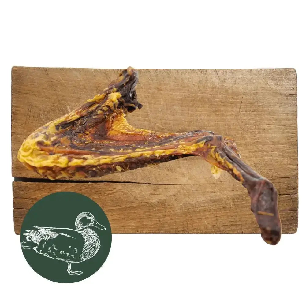 Duck Wings Natural Meat Chew for Dogs on Wooden Board